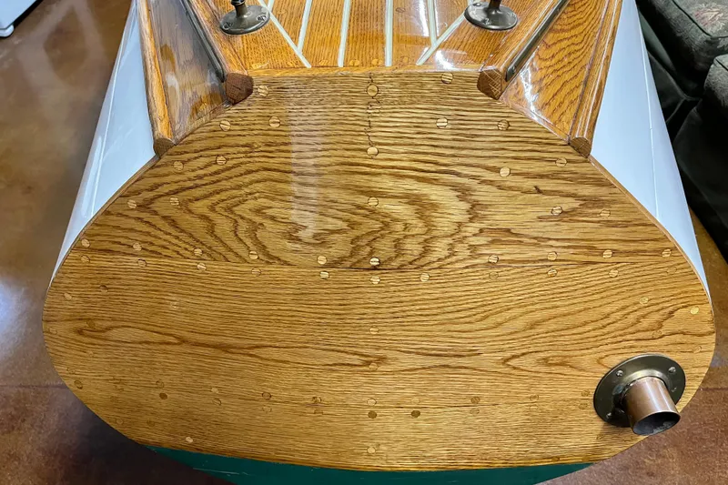 Slide: The Image of Wooden stern of a 1908 Outing launch boat, showcasing detailed craftsmanship. - 9