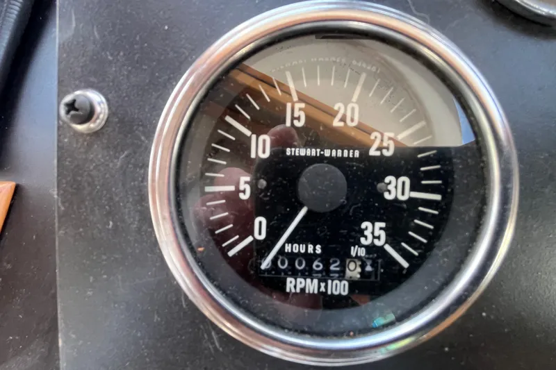Slide: The Image of Tachometer of 1978 Marine Trader 40, showing RPM and engine hours. - 39