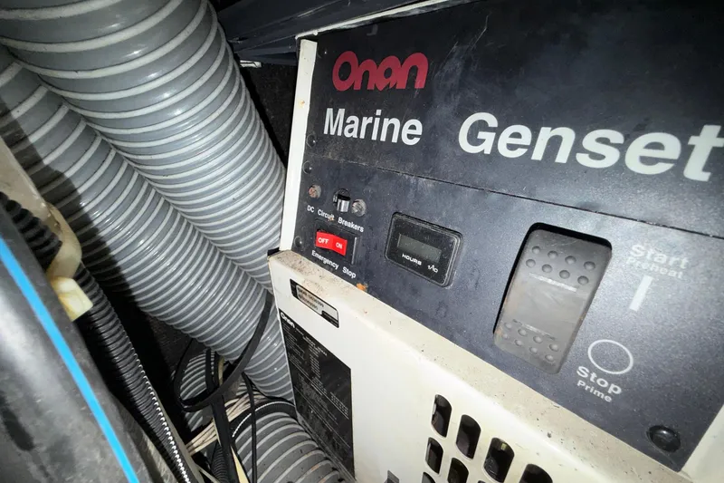 Slide: The Image of Onan Marine Genset in a 2004 Beneteau 57 yacht engine room. - 82