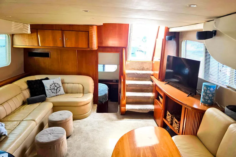 Slide: The Image of Luxurious interior of 2003 Silverton 392 Motor Yacht with plush seating and modern amenities. - 2