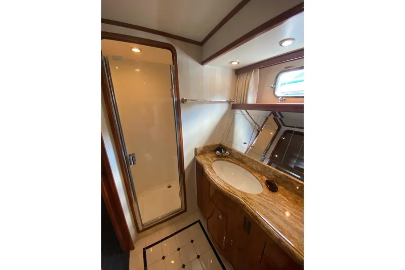 Slide: The Image of Luxurious bathroom in 2006 North Star Yachts 73 Cockpit Motoryacht with elegant fixtures. - 23