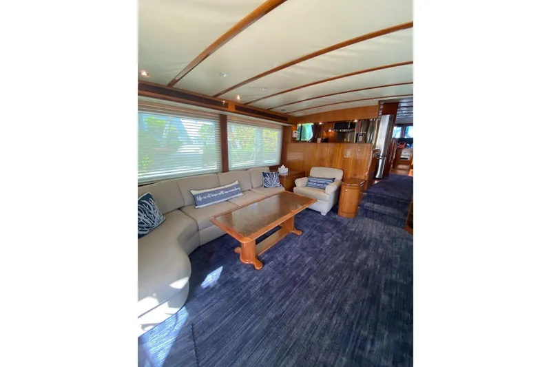 Slide: The Image of Luxurious interior of 2006 North Star Yachts 73 Cockpit Motoryacht with elegant seating and wood finishes. - 30