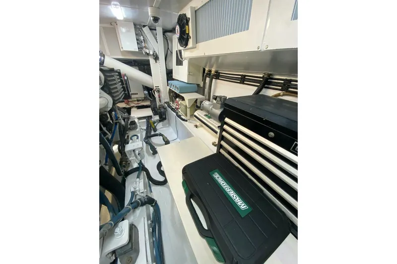 Slide: The Image of Engine room of 2006 North Star Yachts 73 Cockpit Motoryacht with tools and equipment. - 37