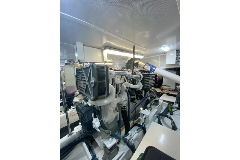Slide: The Image of Engine room of 2006 North Star Yachts 73 Cockpit Motoryacht, showcasing mechanical components. - 38