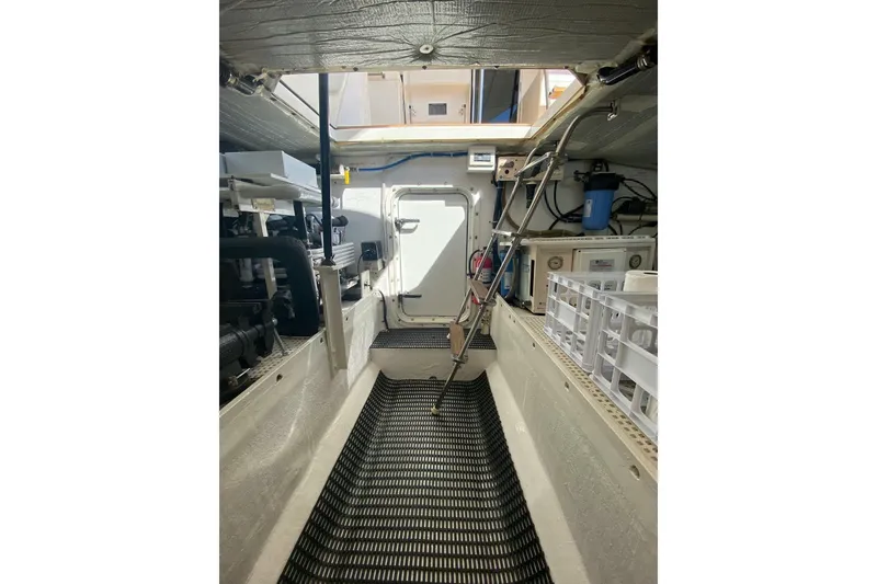 Slide: The Image of Engine room of 2006 North Star Yachts 73 Cockpit Motoryacht, featuring equipment and storage. - 42