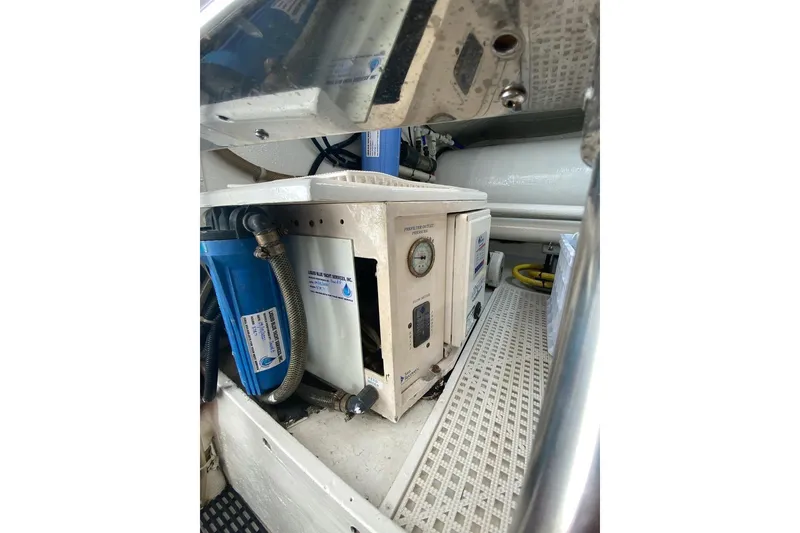 Slide: The Image of Engine room of 2006 North Star Yachts 73 Cockpit Motoryacht, featuring equipment and controls. - 43