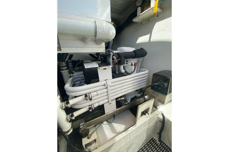 Slide: The Image of Engine room of 2006 North Star Yachts 73 Cockpit Motoryacht, showcasing mechanical components. - 44