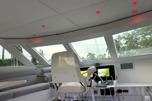 Slide: The Image of Interior helm of 2006 North Star Yachts 73 Cockpit Motoryacht with modern controls and seating. - 57