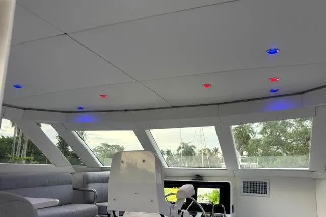 Slide: The Image of Interior of 2006 North Star Yachts 73 Cockpit Motoryacht with modern seating and colorful ceiling lights. - 58
