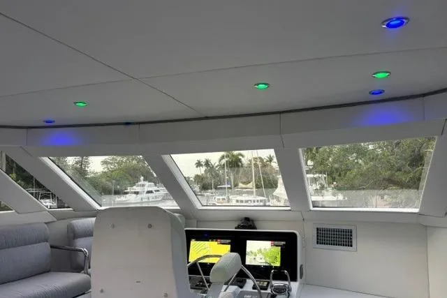 Slide: The Image of Pilothouse interior of 2006 North Star Yachts 73 Cockpit Motoryacht with modern controls and seating. - 59