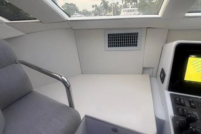 Slide: The Image of Interior view of 2006 North Star Yachts 73 Cockpit Motoryacht helm station. - 60