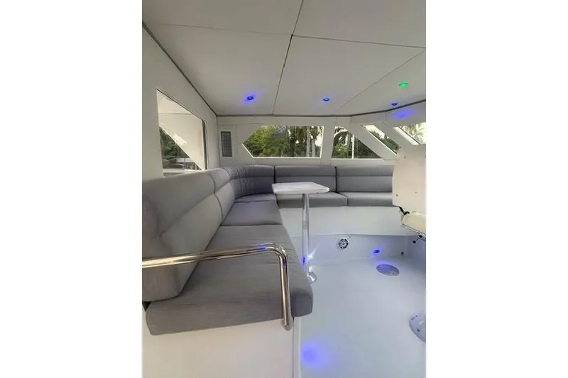 Slide: The Image of Luxurious interior of 2006 North Star Yachts 73 Cockpit Motoryacht with modern seating and lighting. - 63