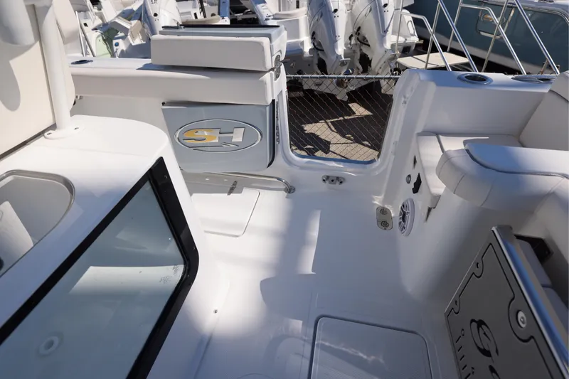 Slide: The Image of 2026 Sea Hunt Gamefish 25 boat interior with seating and storage features. - 23