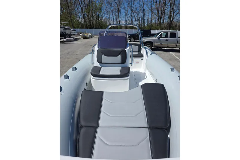 Slide: The Image of 2026 Grand Inflatables G500 boat interior with sleek seating and modern design. - 5