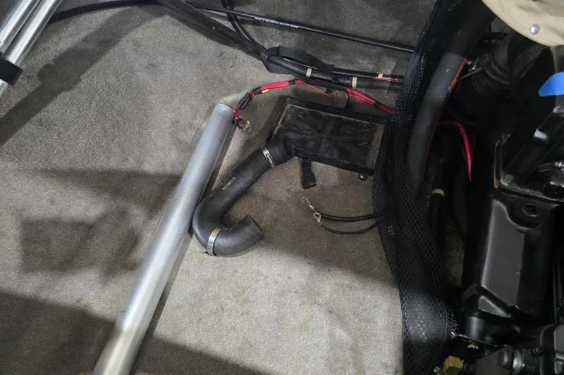 Slide: The Image of Interior view of a 1996 Larson LXi 218 boat showing wiring and components. - 34