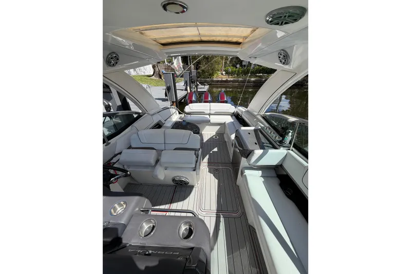 Slide: The Image of 2020 Formula 330 Crossover Bowrider OB interior with luxurious seating and modern design. - 10