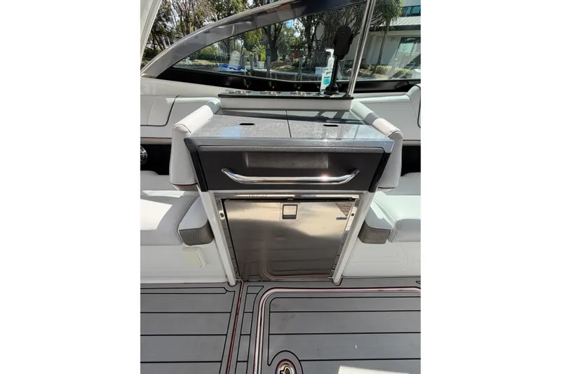Slide: The Image of 2020 Formula 330 Crossover Bowrider OB interior with sleek countertop and seating. - 16