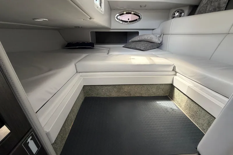 Slide: The Image of Interior cabin of 2020 Formula 330 Crossover Bowrider OB with cushioned seating. - 18