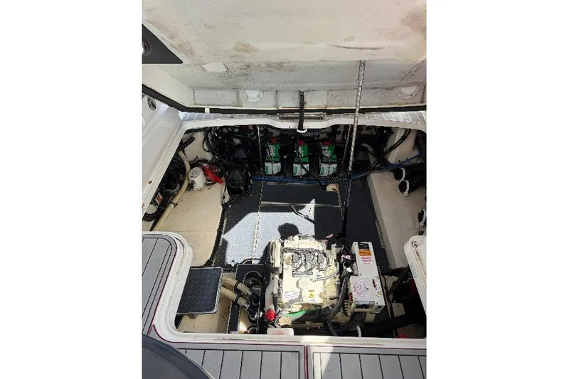 Slide: The Image of Engine compartment of 2020 Formula 330 Crossover Bowrider OB, showcasing mechanical components. - 25