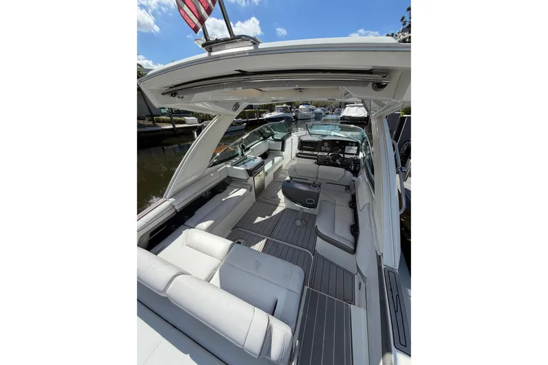 Slide: The Image of 2020 Formula 330 Crossover Bowrider OB interior with luxurious seating and modern dashboard. - 6