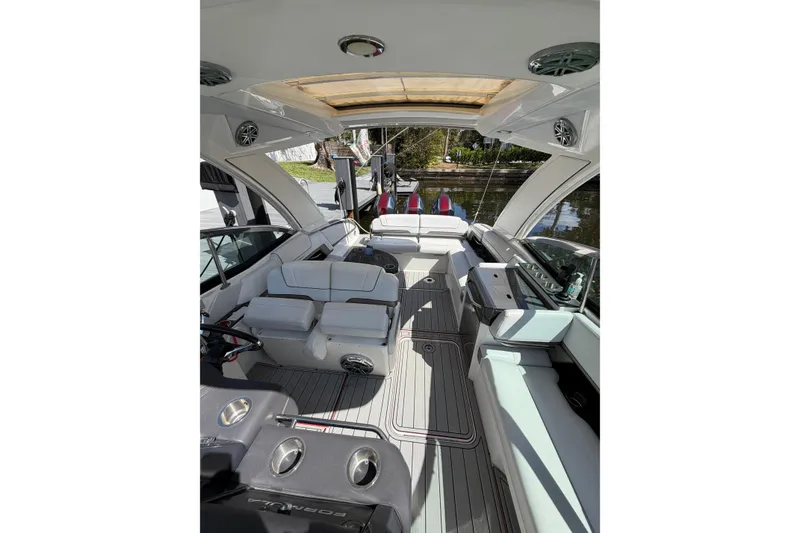Slide: The Image of 2020 Formula 330 Crossover Bowrider OB interior with luxurious seating and modern design. - 7