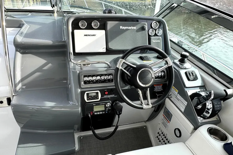 Slide: The Image of 2016 Formula 34 Performance Cruiser helm with advanced navigation and control systems. - 10
