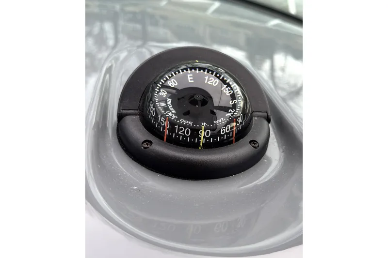 Slide: The Image of Compass on 2016 Formula 34 Performance Cruiser dashboard, showing cardinal directions. - 14