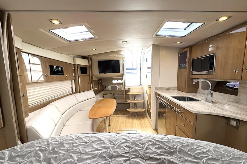 Slide: The Image of Luxurious interior of a 2016 Formula 34 Performance Cruiser with modern amenities and elegant design. - 23