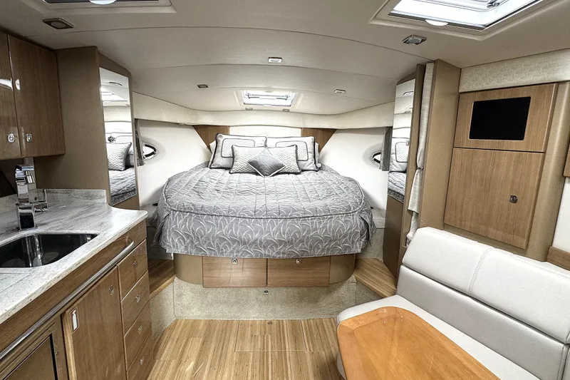 Slide: The Image of Luxurious interior of 2016 Formula 34 Performance Cruiser with cozy bed and modern amenities. - 24