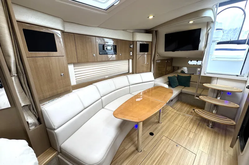 Slide: The Image of Luxurious interior of 2016 Formula 34 Performance Cruiser with modern seating and wooden finishes. - 25