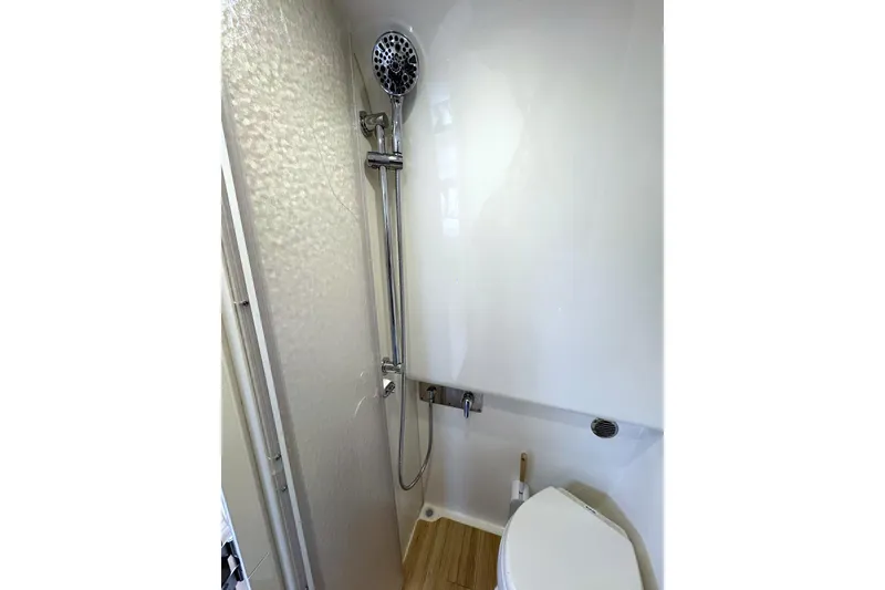 Slide: The Image of 2016 Formula 34 Performance Cruiser bathroom with shower and toilet. - 35