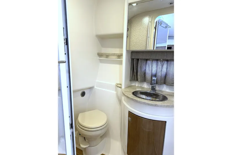 Slide: The Image of 2016 Formula 34 Performance Cruiser bathroom with modern sink and toilet. - 36