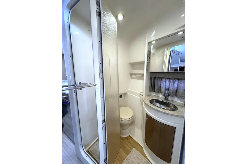 Slide: The Image of 2016 Formula 34 Performance Cruiser bathroom with modern fixtures and compact design. - 37
