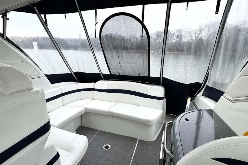 Slide: The Image of Interior of 2016 Formula 34 Performance Cruiser with white seating and panoramic windows. - 9