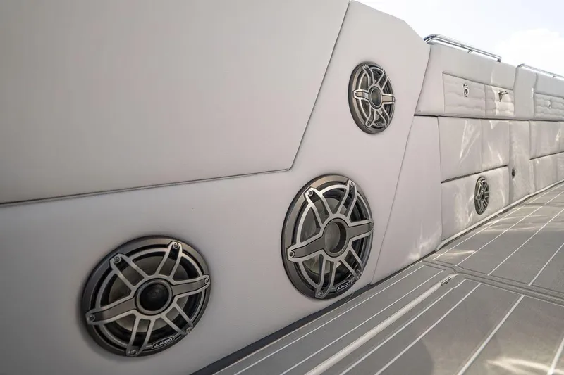 Slide: The Image of Luxury speakers on 2026 Cigarette 42' Auroris boat interior, showcasing premium design. - 6