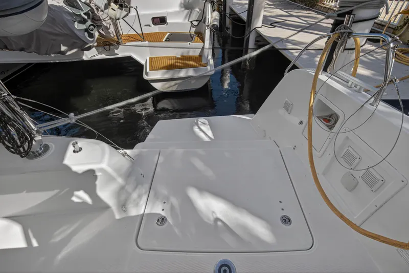 Slide: The Image of 2019 Lagoon 42 catamaran deck, featuring sleek design and modern amenities. - 24