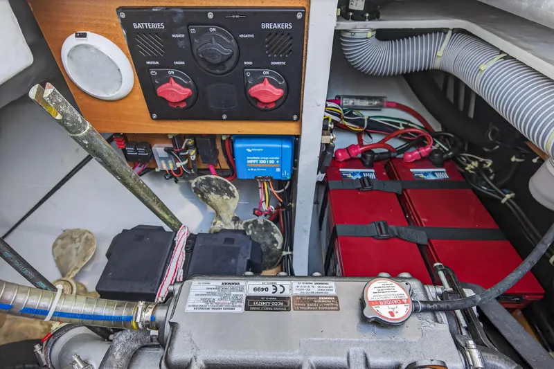 Slide: The Image of Electrical system of a 2019 Lagoon 42 catamaran, featuring batteries and breakers. - 26