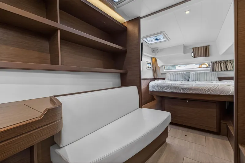 Slide: The Image of Luxurious interior of 2019 Lagoon 42 yacht with cozy bedroom and elegant wood finishes. - 79