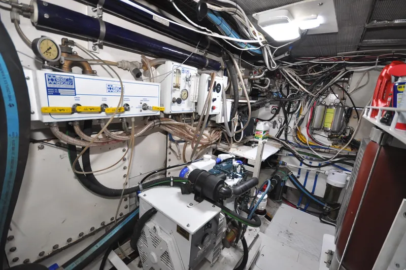 Slide: The Image of Engine room of 1982 Custom Virpack Steelhull with complex wiring and machinery. - 20
