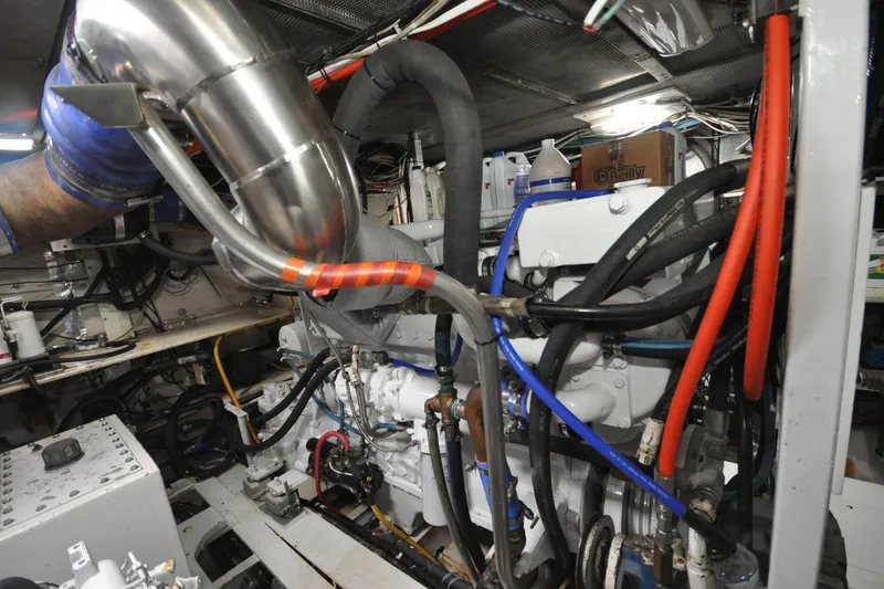 Slide: The Image of Engine room of 1982 Custom Virpack Steelhull with complex piping and wiring. - 23