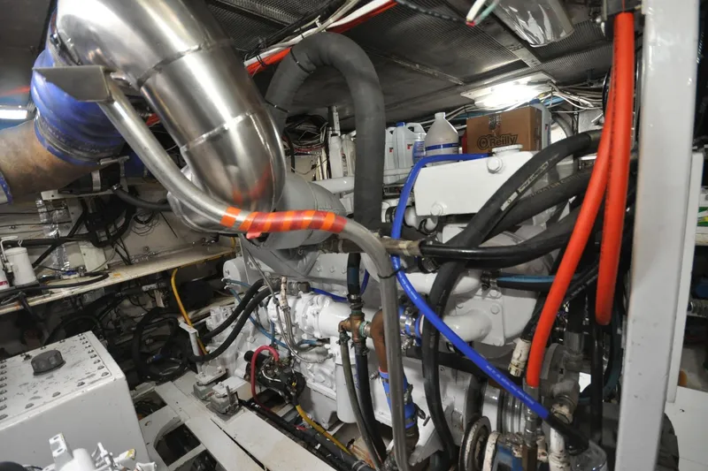 Slide: The Image of Engine room of 1982 Custom Virpack Steelhull with visible pipes and machinery. - 24