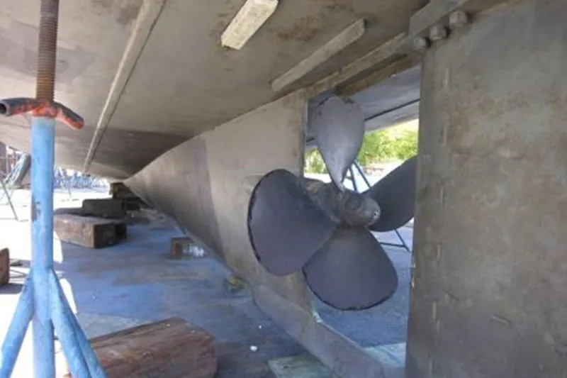 Slide: The Image of Underwater view of 1982 Custom Virpack Steelhull propeller and rudder on dry dock. - 32