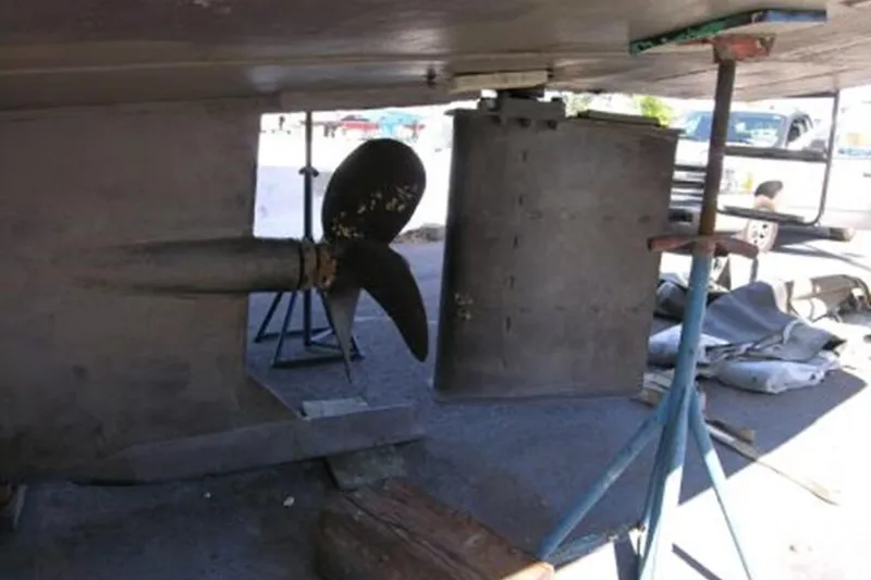 Slide: The Image of Underwater view of 1982 Custom Virpack Steelhull boat propeller and rudder. - 33