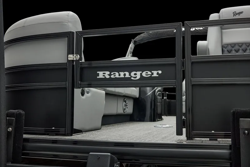 Slide: The Image of Manufacturer Provided Image: 2026 Ranger 220FC boat interior with sleek seating and modern design. - 13