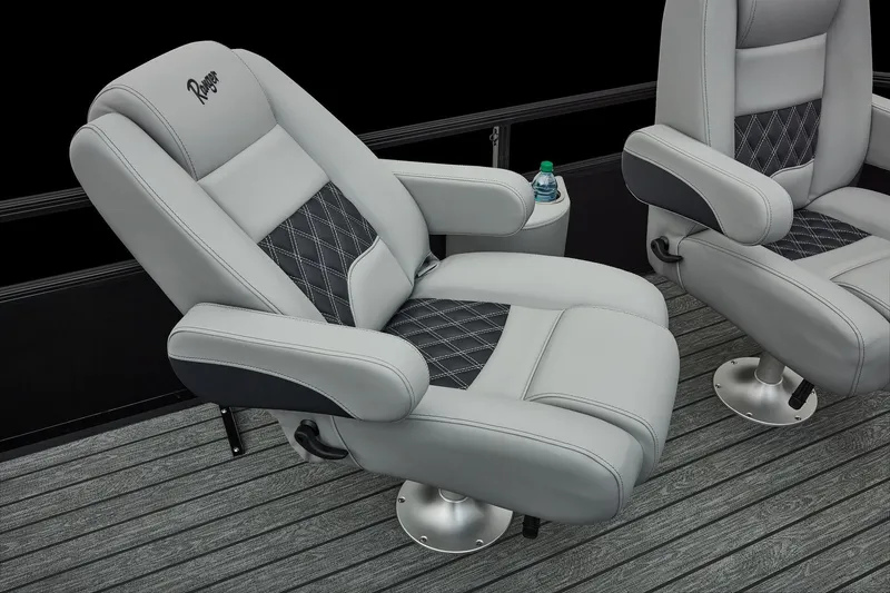 Slide: The Image of Manufacturer Provided Image: Luxurious seating in 2026 Ranger 220FC boat with diamond-stitched upholstery and cup holder. - 17