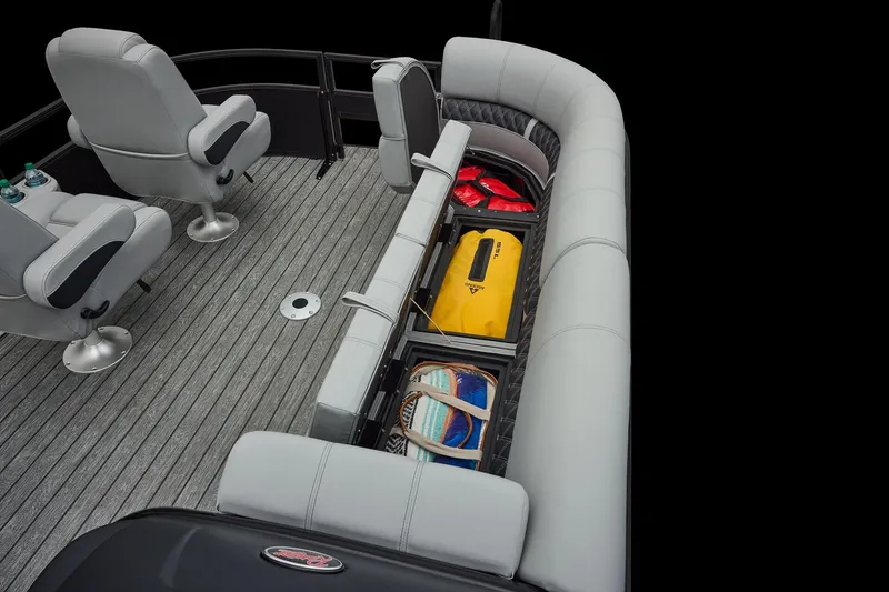 Slide: The Image of Manufacturer Provided Image: 2026 Ranger 220FC boat interior with seating, storage compartments, and accessories. - 18