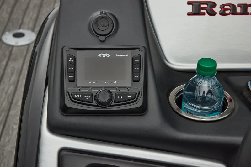 Slide: The Image of Manufacturer Provided Image: Control panel of 2026 Ranger 220FC with audio system and cup holder. - 28