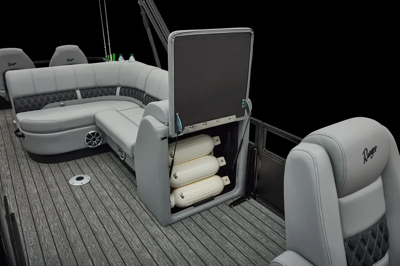 Slide: The Image of Manufacturer Provided Image: 2026 Ranger 220FC boat interior with gray seating and storage compartment. - 33