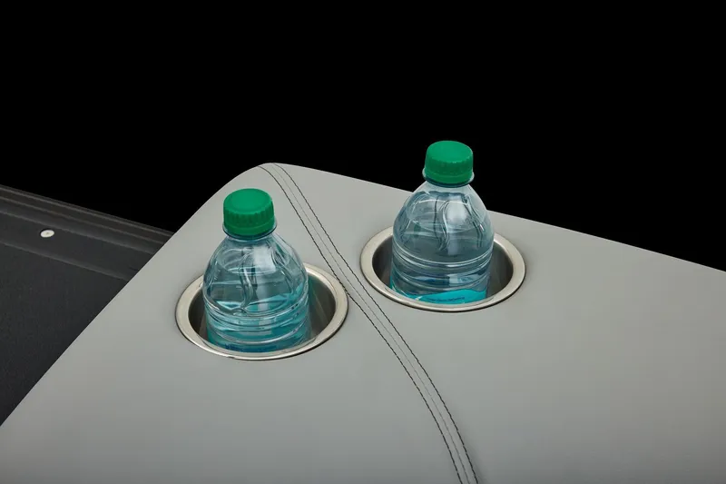 Slide: The Image of Manufacturer Provided Image: Cup holders with water bottles in 2026 Ranger 220FC boat interior. - 36