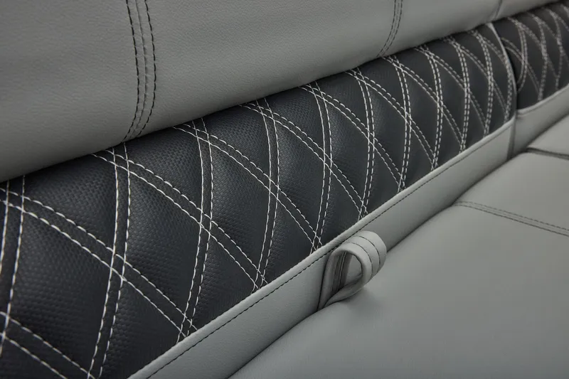 Slide: The Image of Manufacturer Provided Image: Luxurious leather seating with diamond stitching in 2026 Ranger 220FC model. - 37